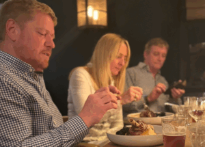 James enjoying leg of Lamb...and a beer.