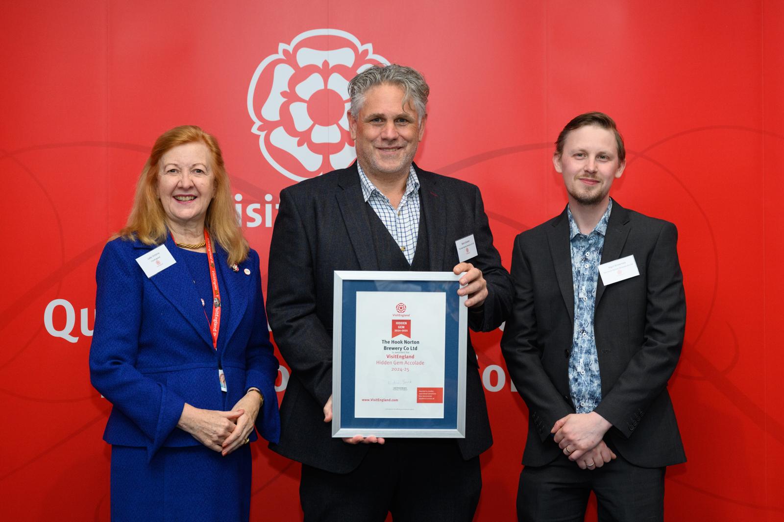 Mark Graham and Nigel Brownsea collecting the Brewery's Hidden Gem Award from VisitEngland Chairman , Lady Victoria Borwick